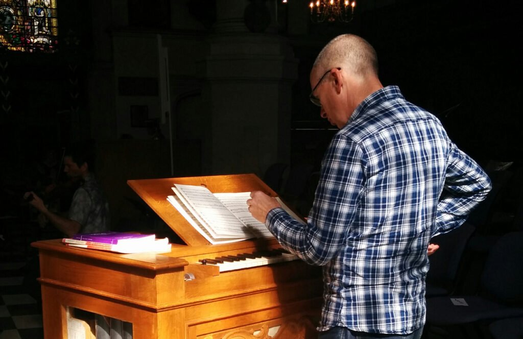 Nicholas Houghton with his Goetze and Gwynn Chamber Organ